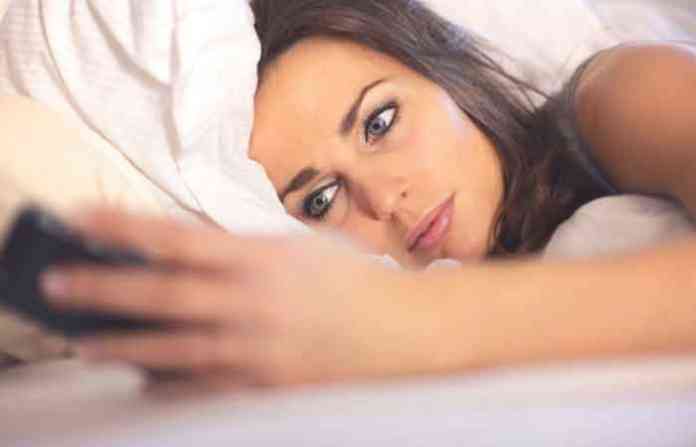mobile-on-bed