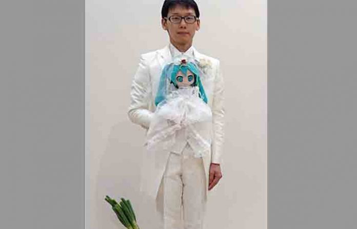 japnese-man-with-doll