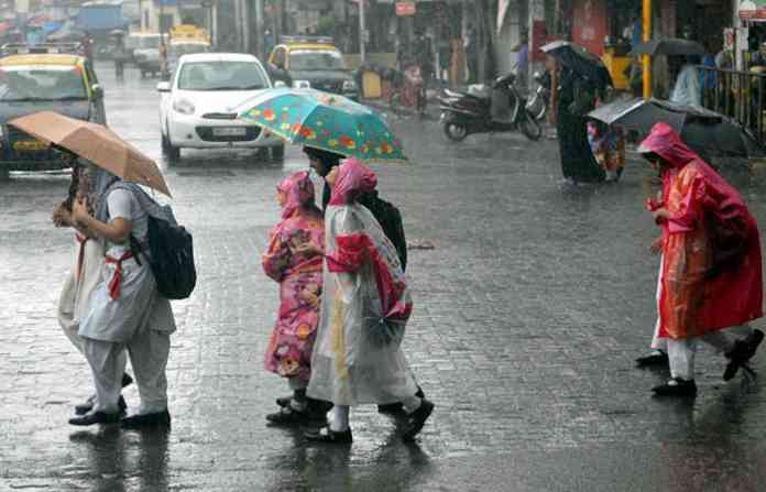 school-kids-in-rain-wearing-rain-coats