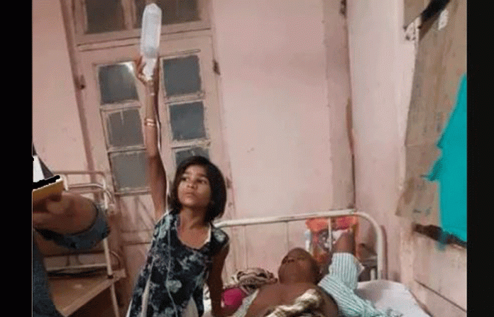 girl-stand-with-saline-for