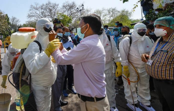sanitisation-suit-checking