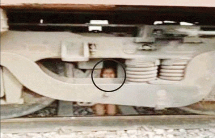 baby-stuck-in-engine