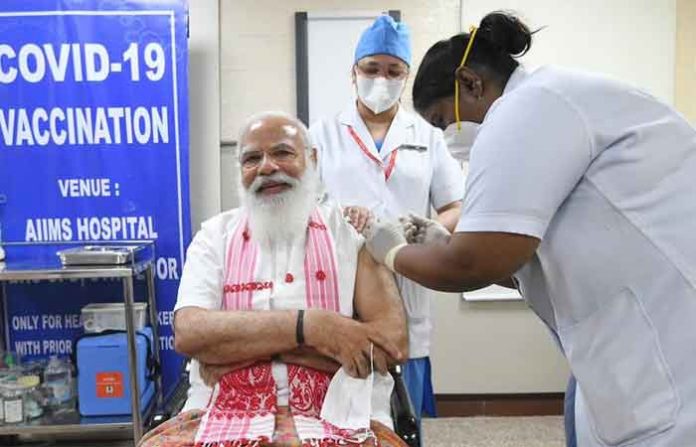 pm-modi-takes-first-dose-of-coronavirus-vaccine-at-delhis-aiims pm-modi-takes-first-dose-of-coronavirus-vaccine-at-delhis-aiims