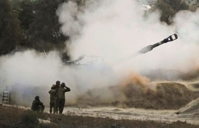 An Israeli mobile artillery unit fires a shell from southern Israel towards the Gaza Strip, in a position near the Israel-Gaza border, Wednesday, Oct. 25, 2023