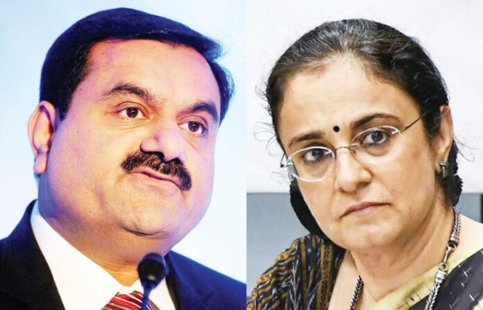 Madhavi Puri Butch and Gautam Adani