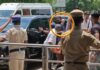 madurai-airport-actor-politician-tvk-vijay-security-gun-at-fan