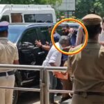 madurai-airport-actor-politician-tvk-vijay-security-gun-at-fan