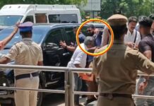 madurai-airport-actor-politician-tvk-vijay-security-gun-at-fan