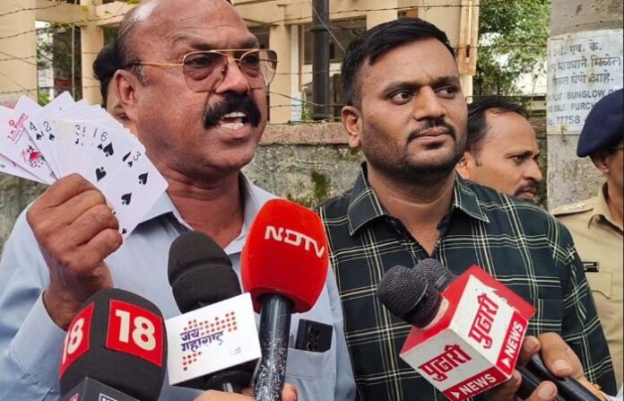 Shiv Sainiks Hurl Cards at Minister Kokate in Nashik Over 'Jungle Rummy' Row Shiv Sainiks Hurl Cards at Minister Kokate in Nashik Over 'Jungle Rummy' Row