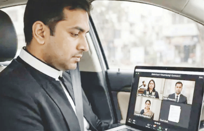 delhi-high-court-slaps-one-lakh-rupees-fine-on-advocate-attending-virtual-hearing-from-moving-car-justice-om-prakash-shukla delhi-high-court-slaps-one-lakh-rupees-fine-on-advocate-attending-virtual-hearing-from-moving-car-justice-om-prakash-shukla